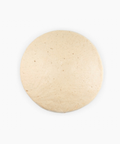 Artisan gluten-free pizza crust ready to top and bake